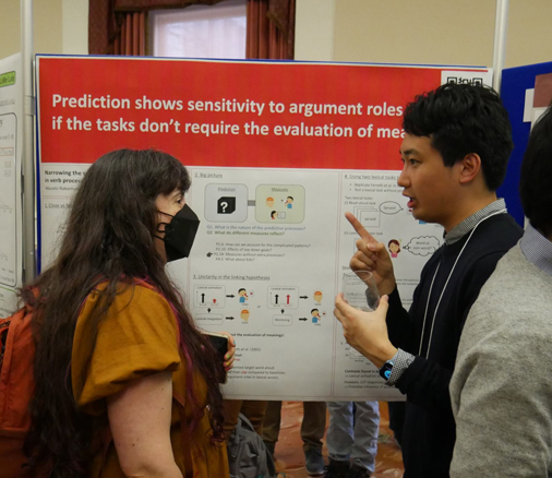 students presenting a poster